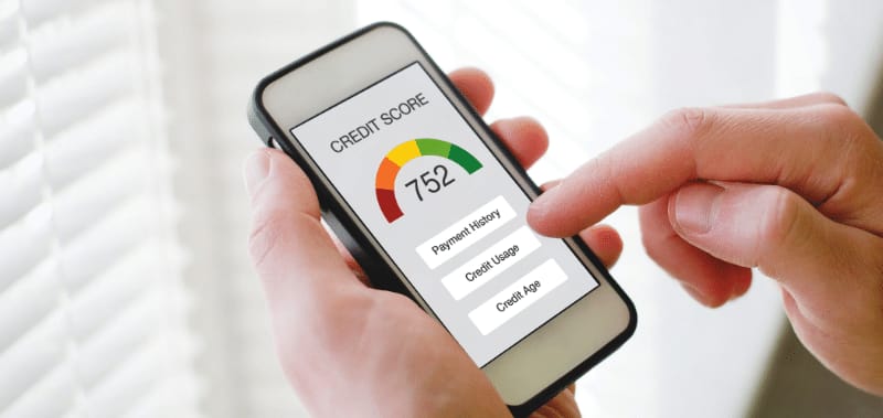 A person using Credit Karma's credit monitoring and alerts