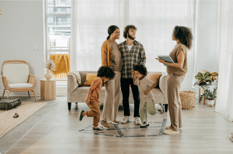 A family looking at a rent-to-own home